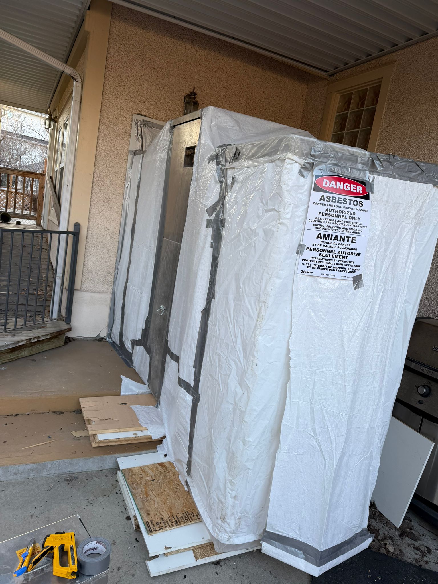 Professional asbestos containment enclosures on a Calgary property